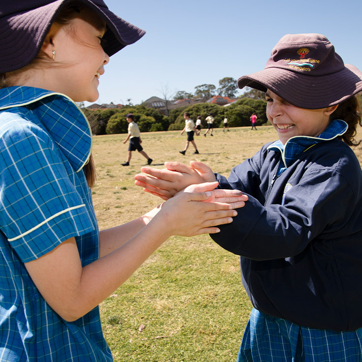 Students playing games outside at St Angela's Primary School Castle Hill